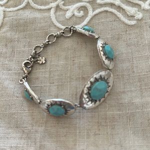 Lucky Brand silver and turquoise color adjustable bracelet.